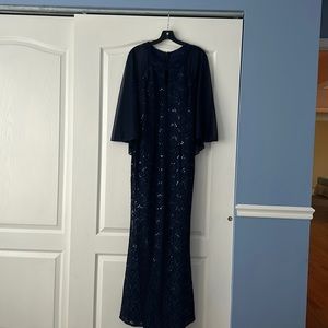 Beautiful Navy Sequined Gown with built in sheer cape.